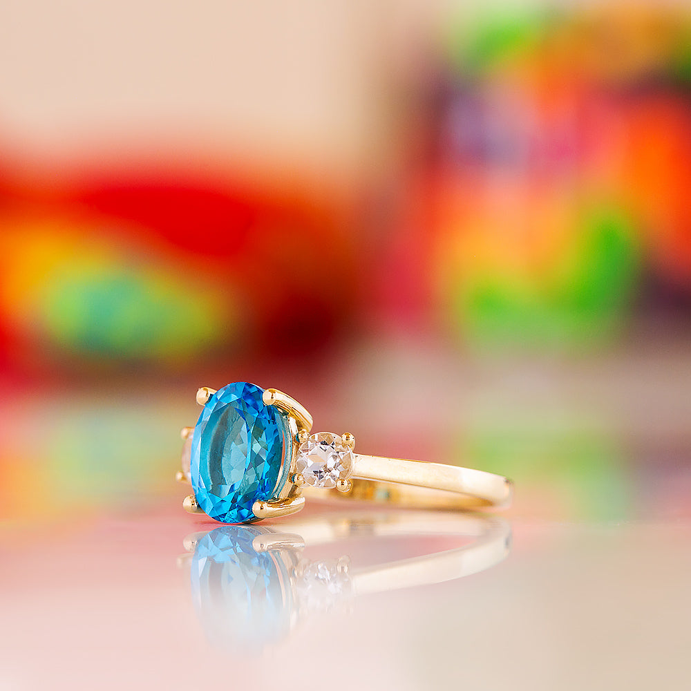 Hallie, a Swiss Blue Topaz and Clear Quartz Trilogy Ring - Victoria's Jewellery