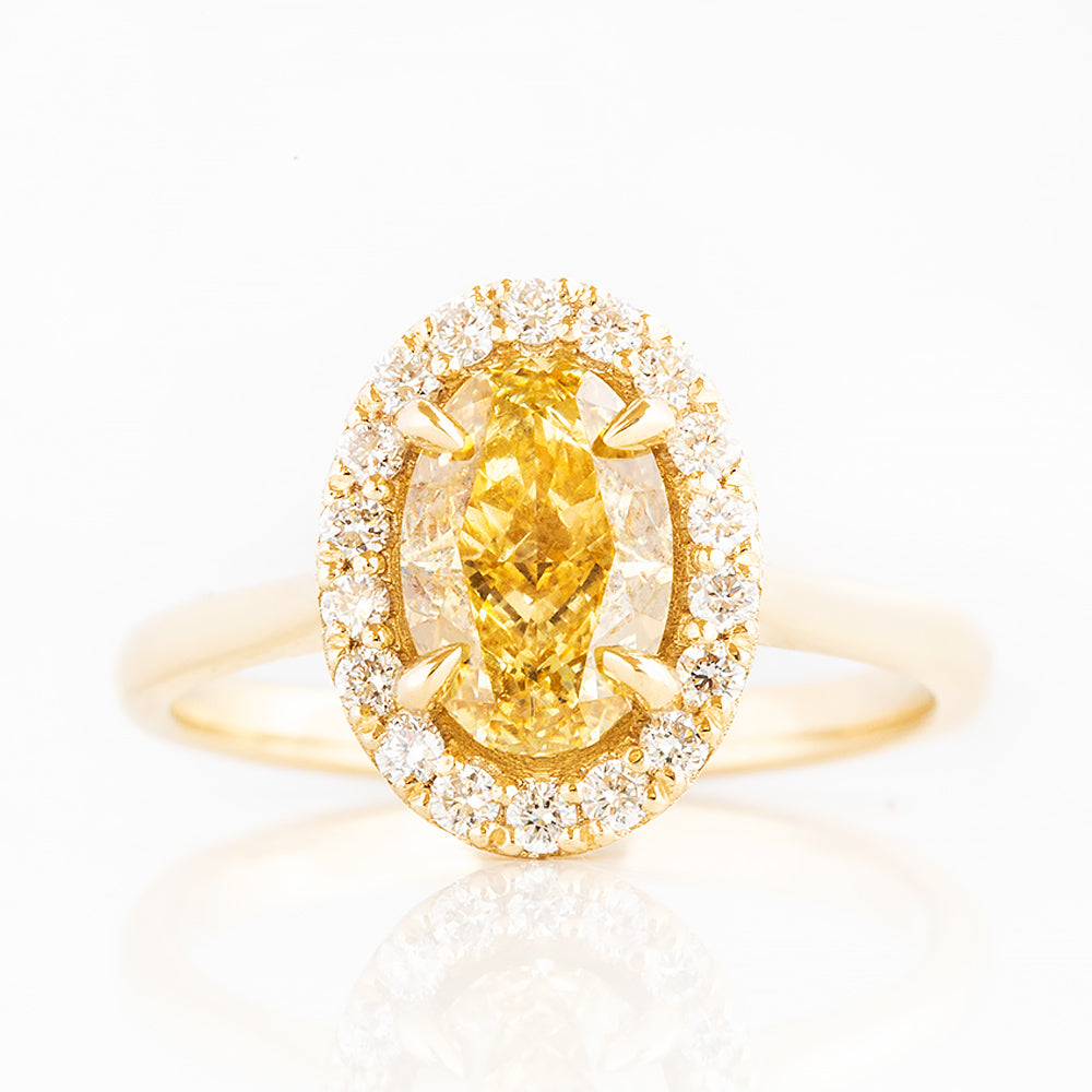 Tilana, an Oval cut Yellow Diamond Halo Engagement Ring - 1.5ct