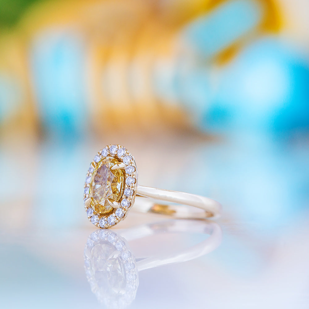 Tilana, an Oval cut Yellow Diamond Halo Engagement Ring - 1.5ct