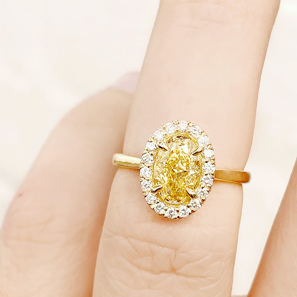 Tilana, an Oval cut Yellow Diamond Halo Engagement Ring - 1.5ct