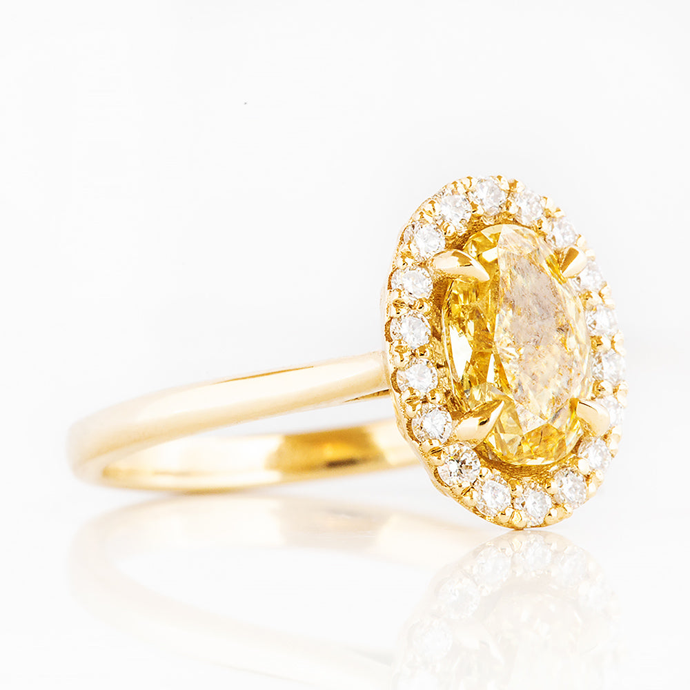 Tilana, an Oval cut Yellow Diamond Halo Engagement Ring - 1.5ct