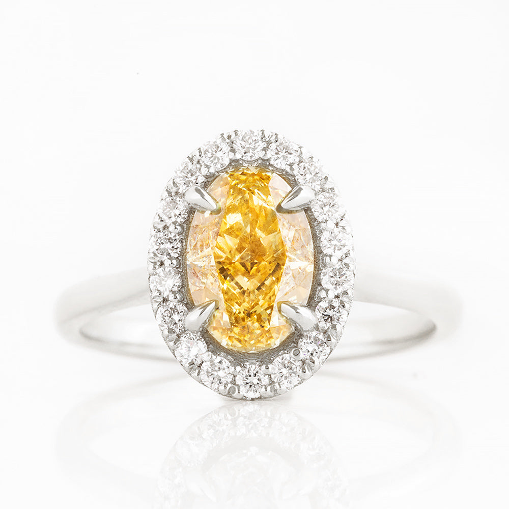 Tilana, an Oval cut Yellow Diamond Halo Engagement Ring - 1.5ct