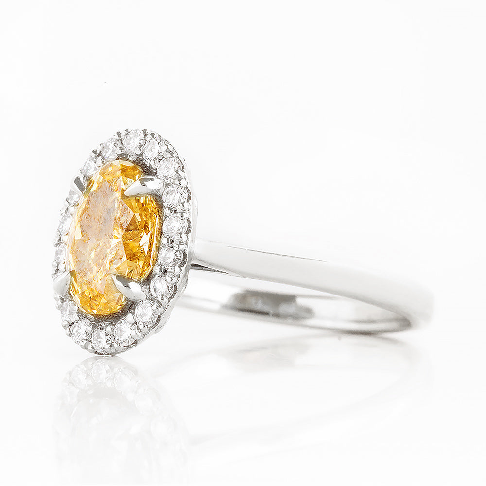 Tilana, an Oval cut Yellow Diamond Halo Engagement Ring - 1.5ct