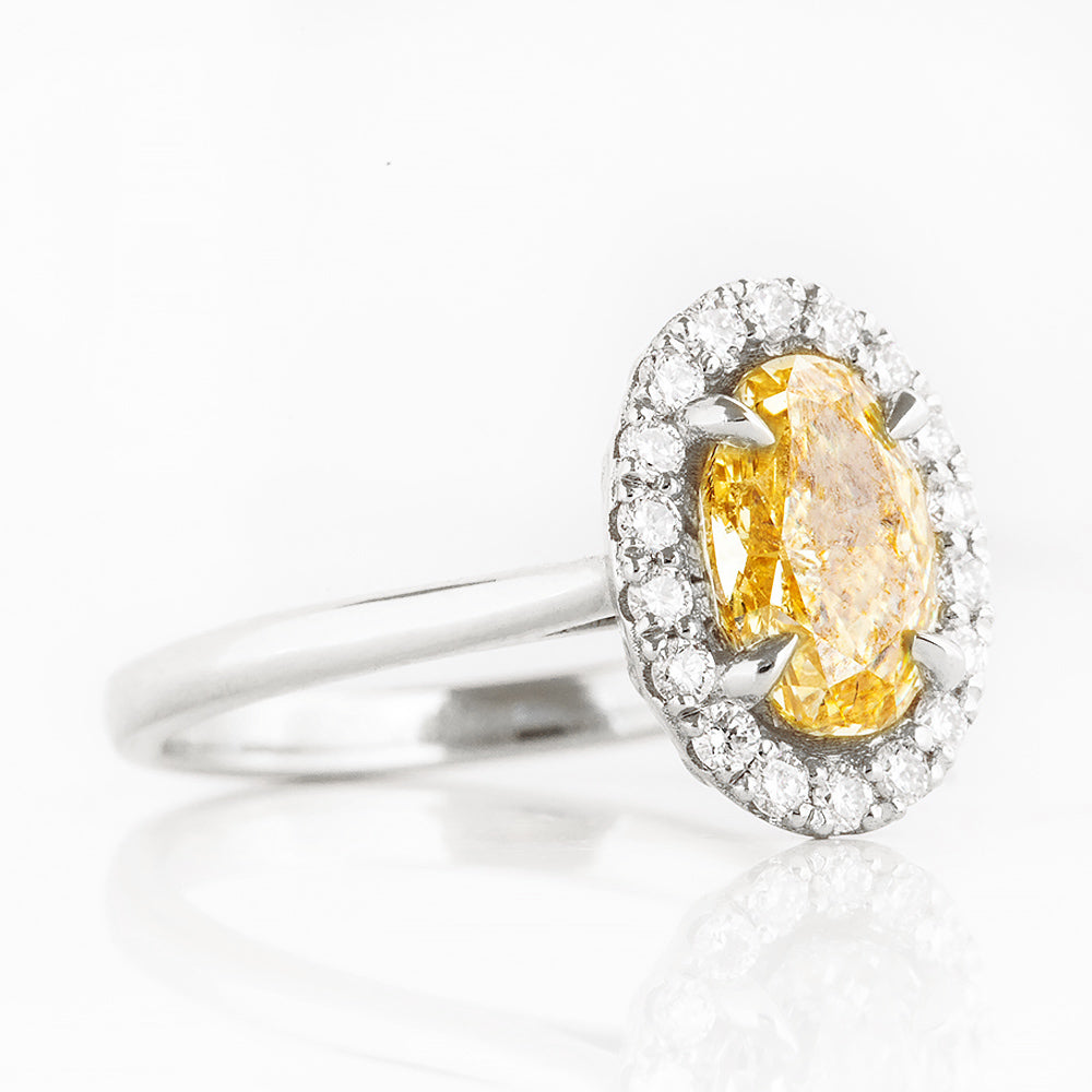 Tilana, an Oval cut Yellow Diamond Halo Engagement Ring - 1.5ct