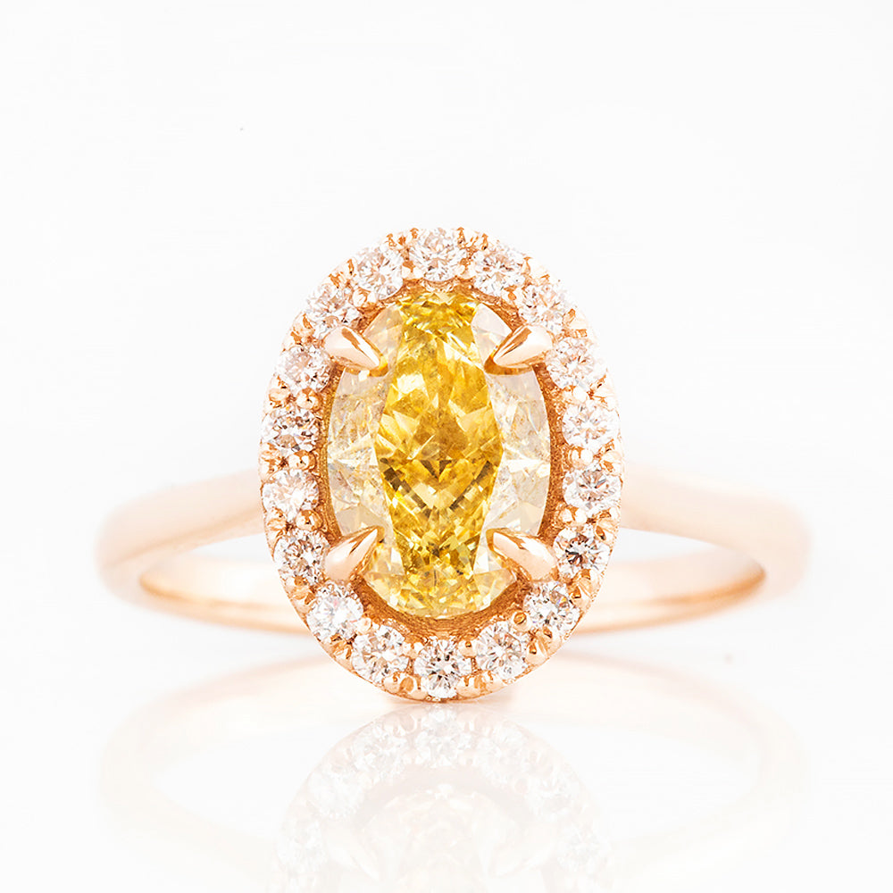 Tilana, an Oval cut Yellow Diamond Halo Engagement Ring - 1.5ct