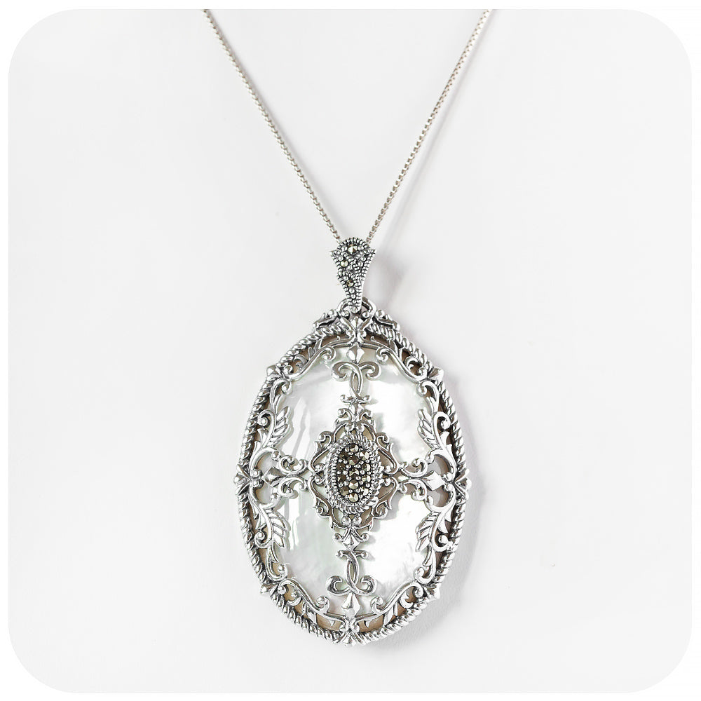 Oval Mother of Pearl and Marcasite Pendant in Sterling Silver