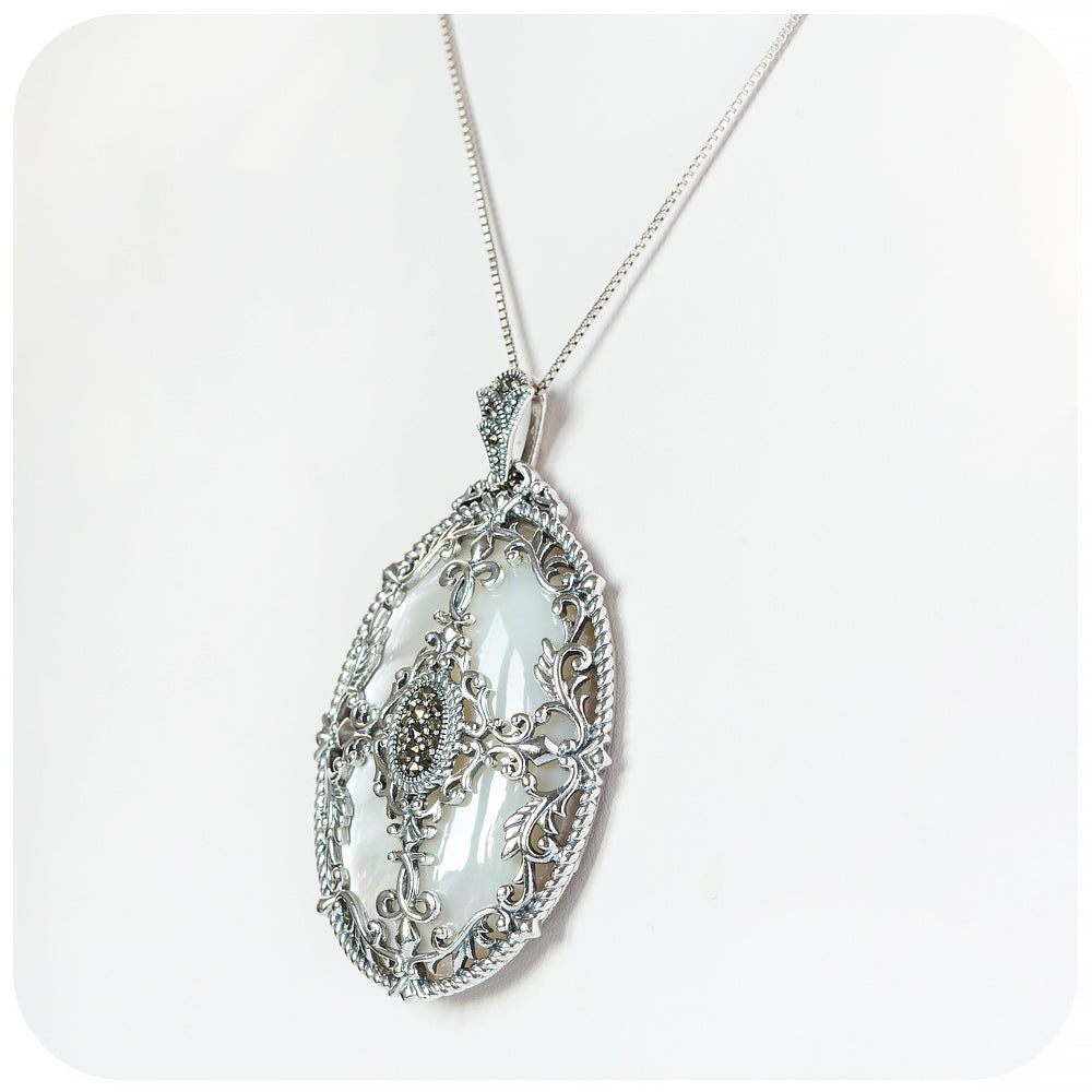Oval Mother of Pearl and Marcasite Pendant in Sterling Silver