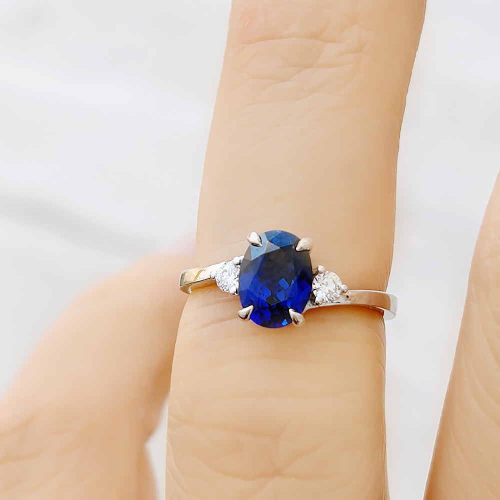 Georgie, a Blue Sapphire and Diamond Trilogy Ring - 8x6mm
