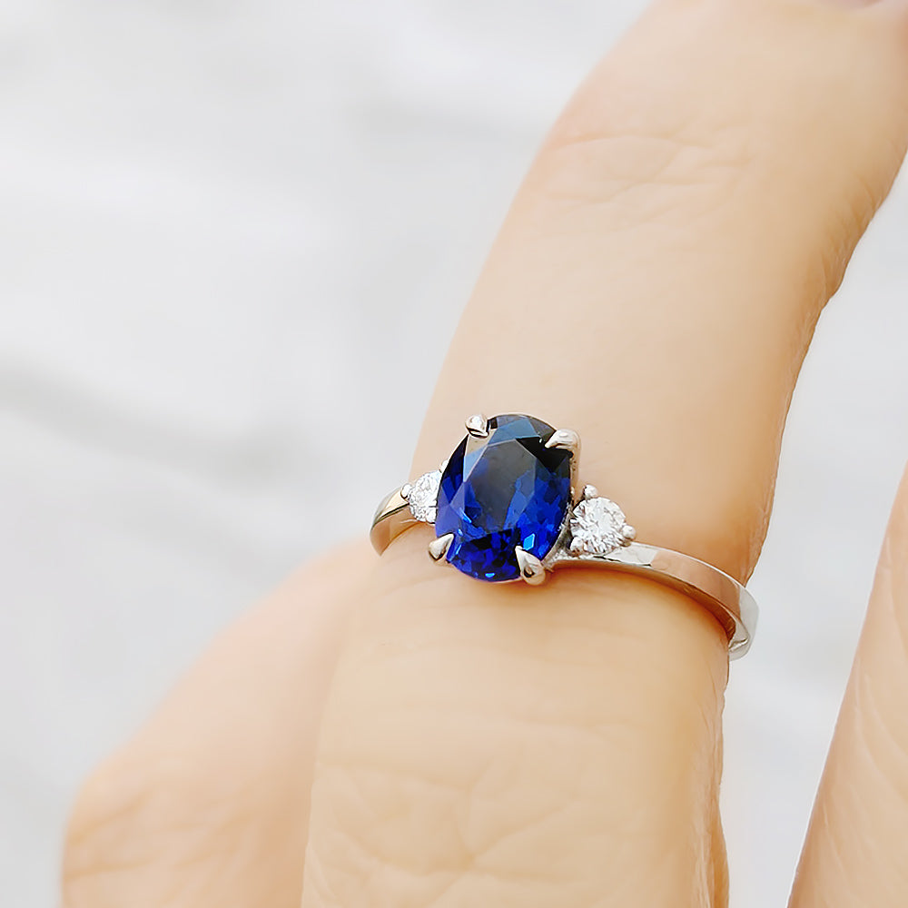 Georgie, a Blue Sapphire and Diamond Trilogy Ring - 8x6mm