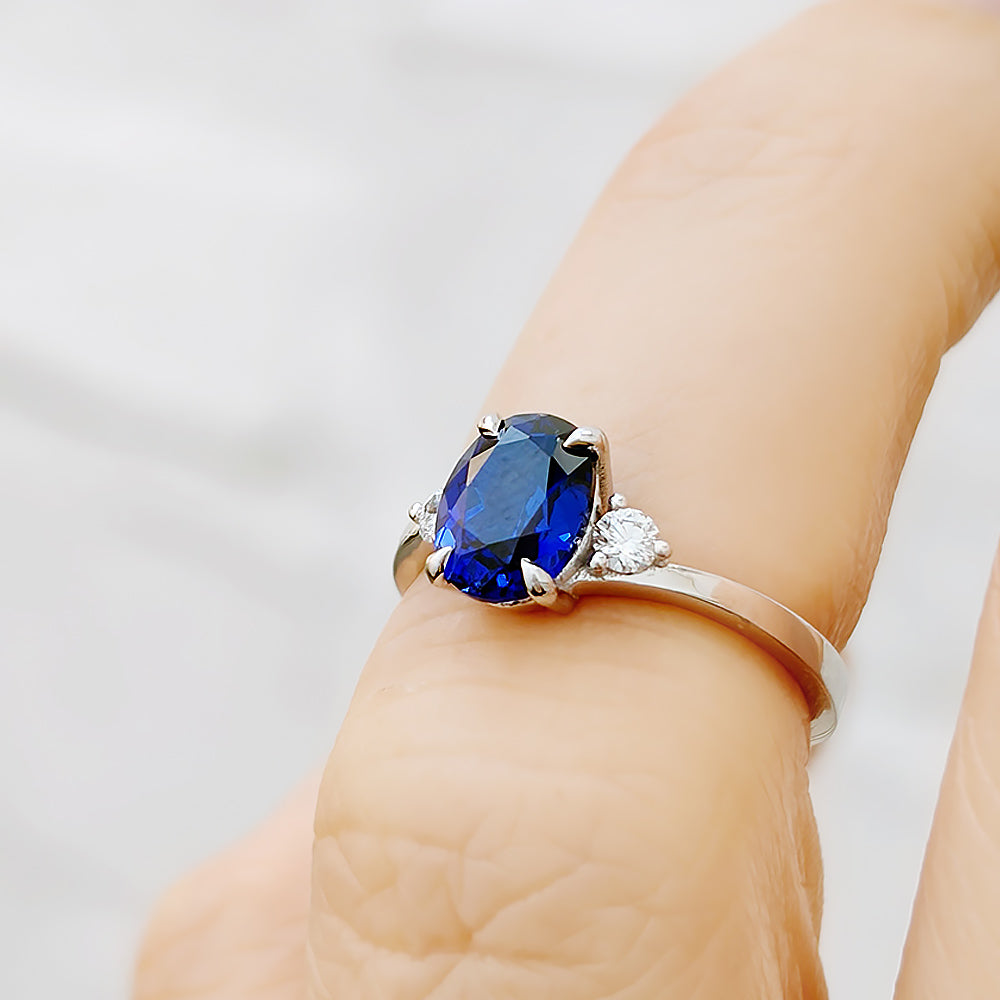 Georgie, a Blue Sapphire and Diamond Trilogy Ring - 8x6mm