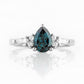 Ariana Mini, a Pear cut London Blue Topaz and Lab Diamond Ring - Victoria's Jewellery