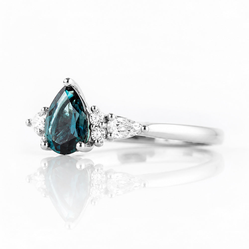Ariana Mini, a Pear cut London Blue Topaz and Lab Diamond Ring - Victoria's Jewellery