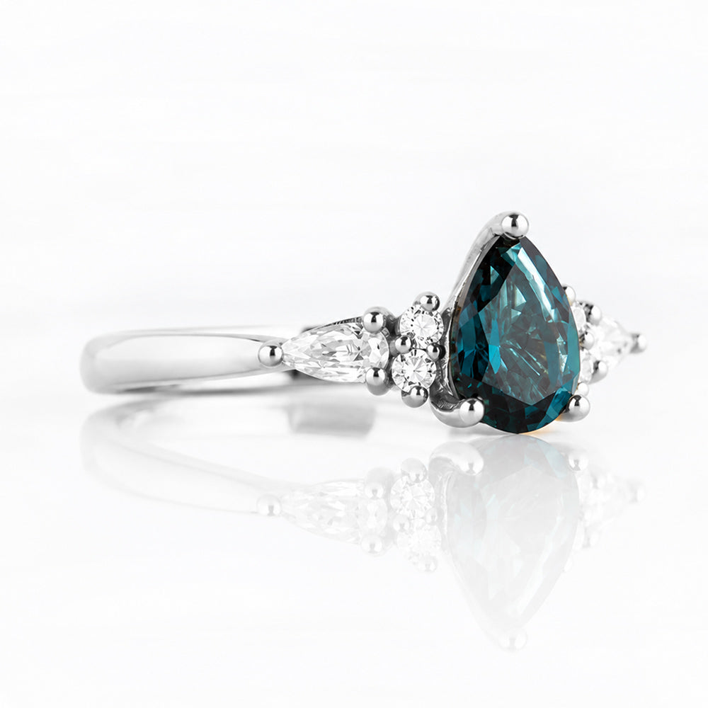 Ariana Mini, a Pear cut London Blue Topaz and Lab Diamond Ring - Victoria's Jewellery