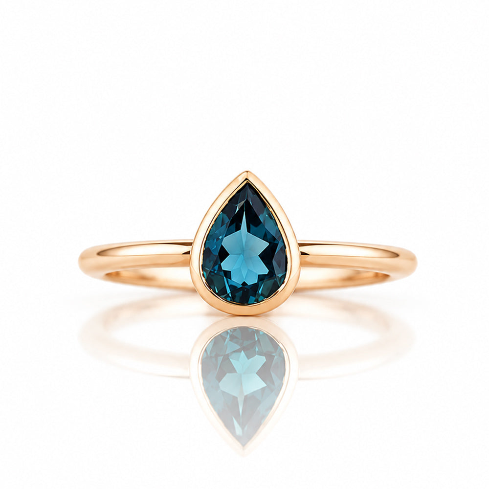 Linda, Pear cut London Blue Topaz Ring - Victoria's Jewellery