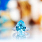 René, a Sky Blue Topaz and Lab Diamond Ring