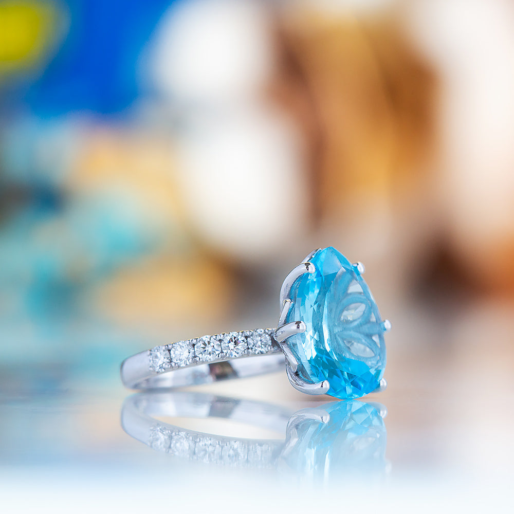 René, a Sky Blue Topaz and Lab Diamond Ring