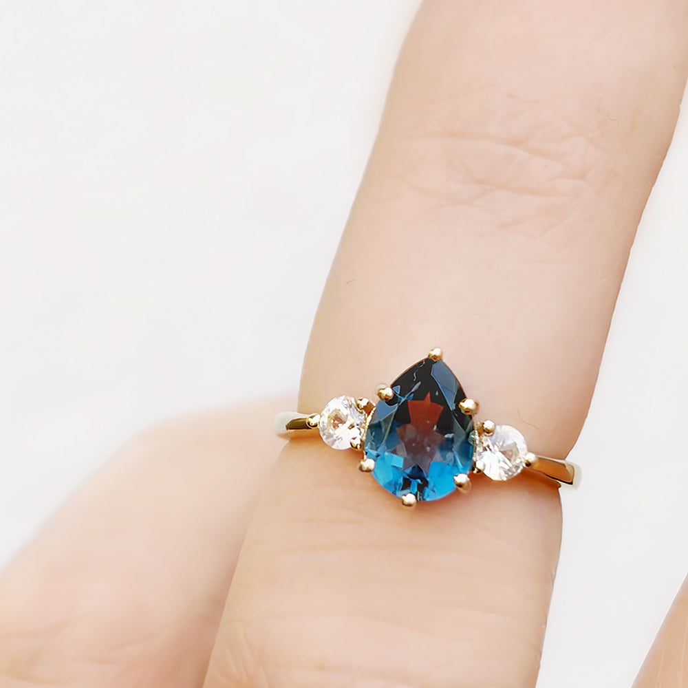 Sienna, a London Blue Topaz and Lab Diamond Trilogy Ring