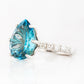 René, a Sky Blue Topaz and Lab Diamond Ring
