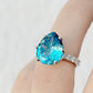René, a Sky Blue Topaz and Lab Diamond Ring