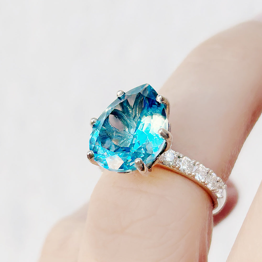 René, a Sky Blue Topaz and Lab Diamond Ring