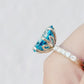 René, a Sky Blue Topaz and Lab Diamond Ring