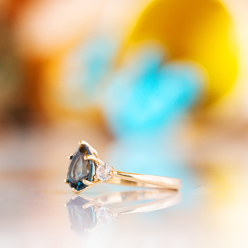 Sienna, a London Blue Topaz and White Sapphire Trilogy Ring - Victoria's Jewellery
