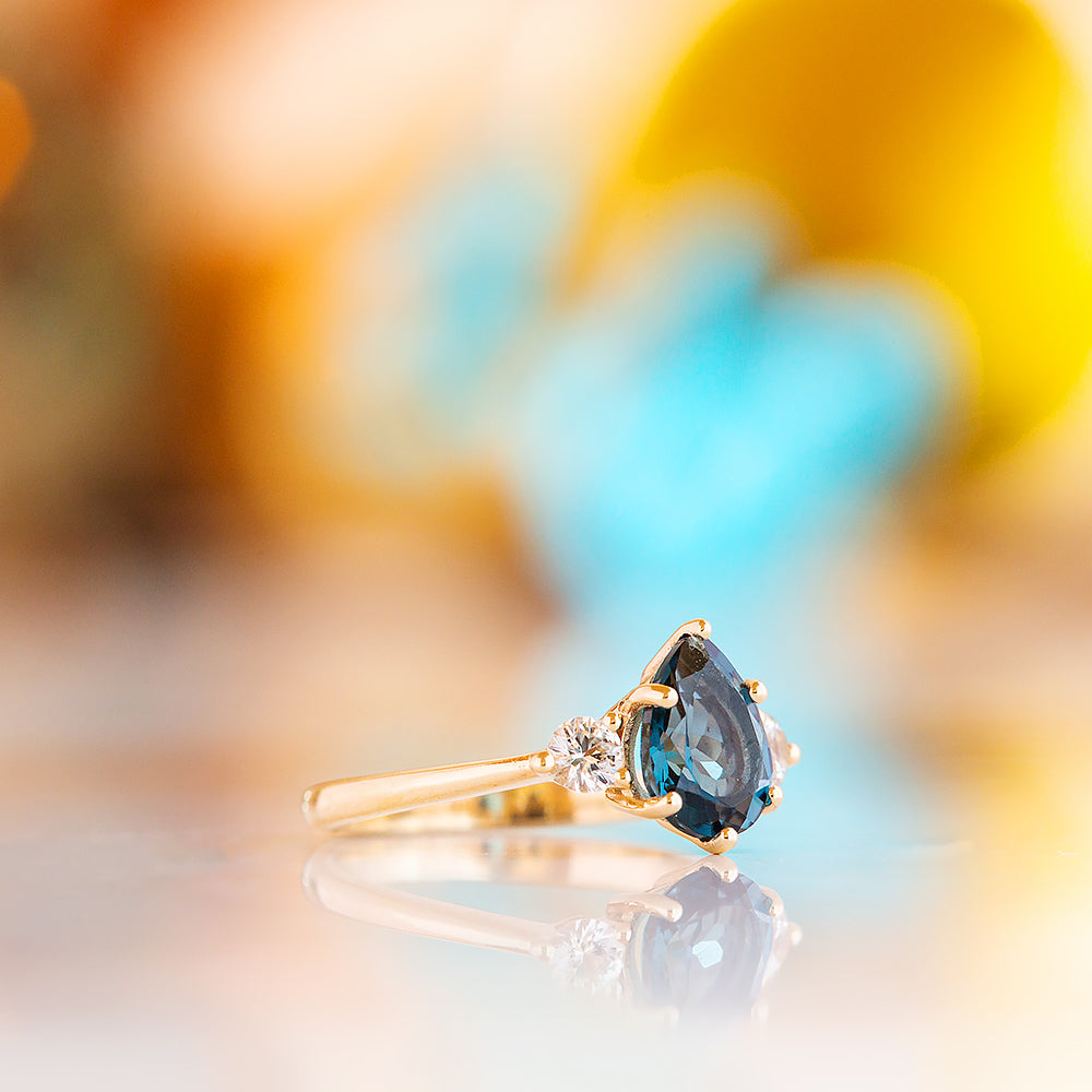 Sienna, a London Blue Topaz and White Sapphire Trilogy Ring - Victoria's Jewellery