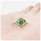 round cut peridot and london blue topaz flower design ring 