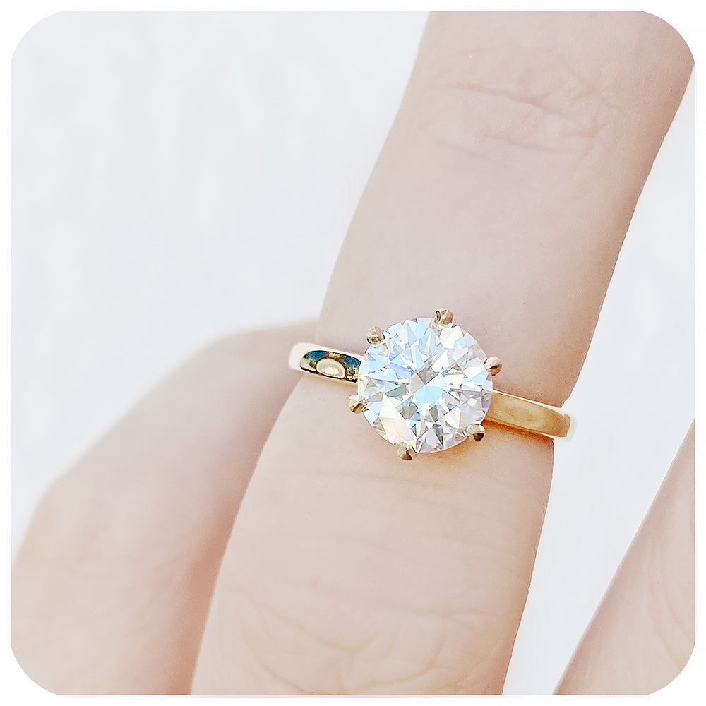 Brilliant round cut Moissanite six claw Solitaire Engagement Ring in gold - Victoria's Jewellery