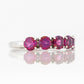 Annie, a Rhodolite Half Eternity Ring
