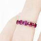 Annie, a Rhodolite Half Eternity Ring