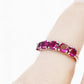 Annie, a Rhodolite Half Eternity Ring