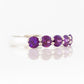 Danelle, an Amethyst Half Eternity Trellis Ring