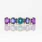 Annie, a Blue and Purple Half Eternity Ring