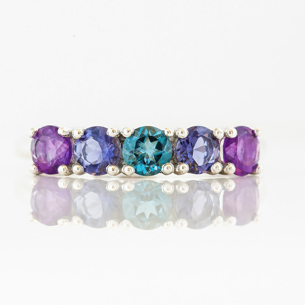 Annie, a Blue and Purple Half Eternity Ring