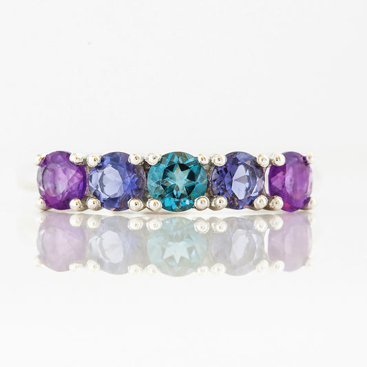 Annie, a Blue and Purple Half Eternity Ring