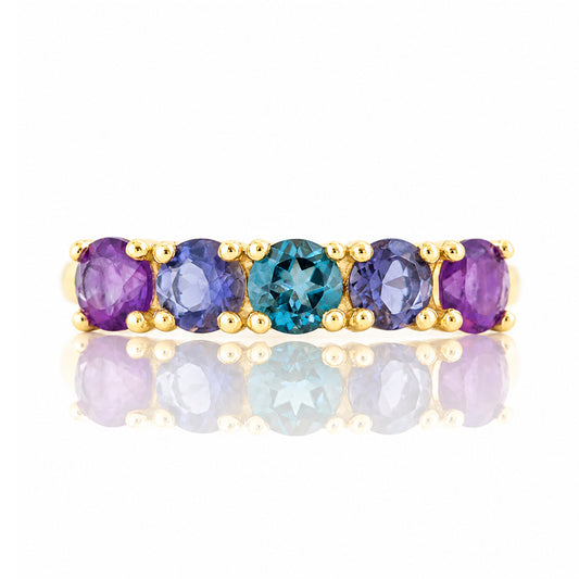 Annie, a Blue and Purple Half Eternity Ring