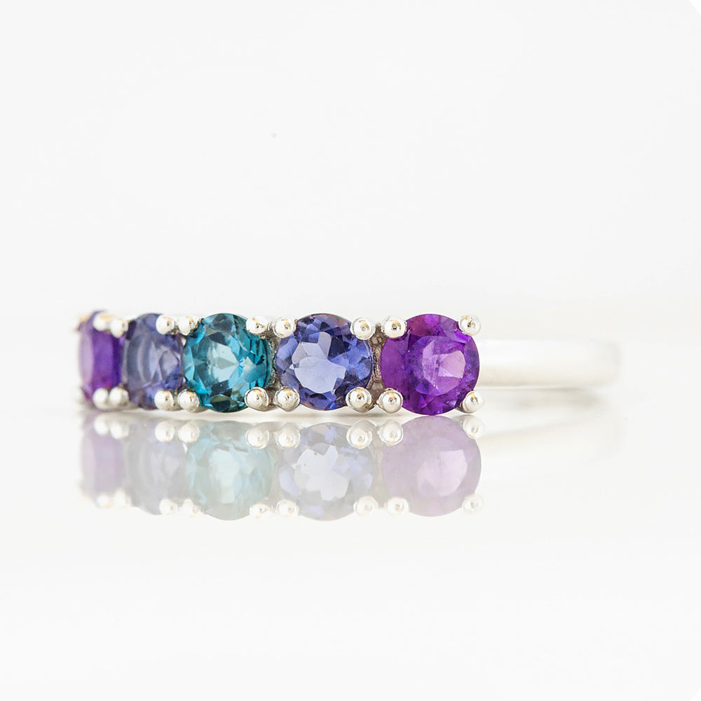 Annie, a Blue and Purple Half Eternity Ring