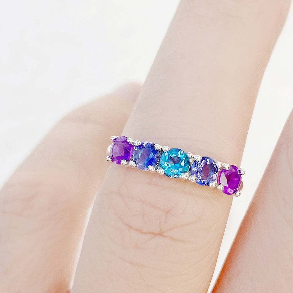 Annie, a Blue and Purple Half Eternity Ring