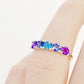 Annie, a Blue and Purple Half Eternity Ring