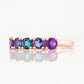 Annie, a Blue and Purple Half Eternity Ring - Victoria's Jewellery