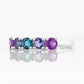 Annie, a Blue and Purple Half Eternity Ring - Victoria's Jewellery