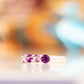 Danelle, a Purple and Pink Amethyst Half Eternity Trellis Ring