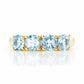Celine, a Sky Blue Topaz Four Stone Half Eternity Ring