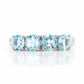 Celine, a Sky Blue Topaz Four Stone Half Eternity Ring