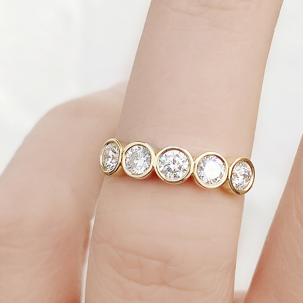 Violet, a Lab Diamond Bezel Set Half Eternity Ring