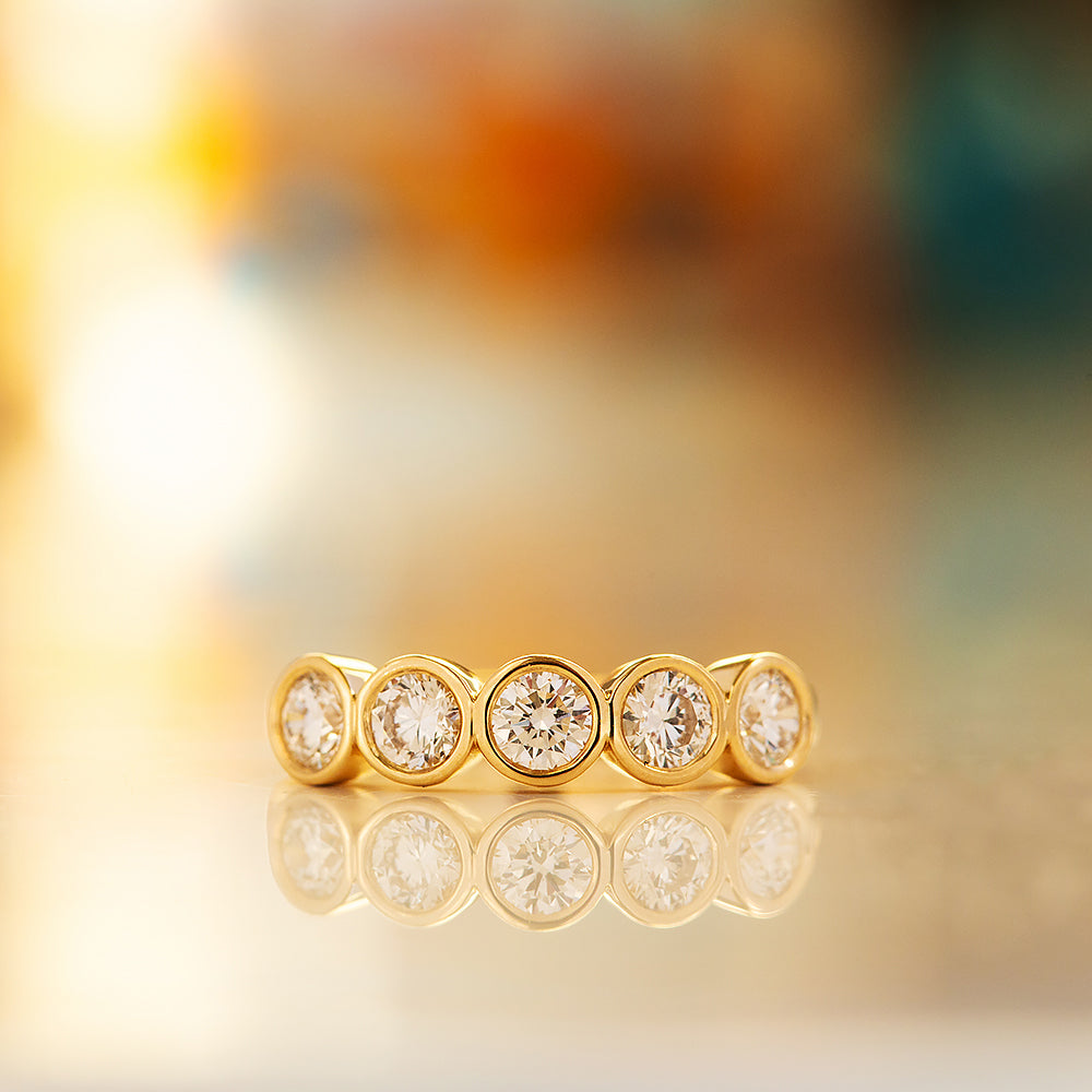 Violet, a Lab Diamond Bezel Set Half Eternity Ring