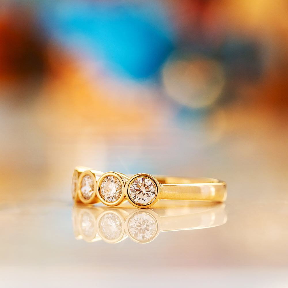 Violet, a Lab Diamond Bezel Set Half Eternity Ring