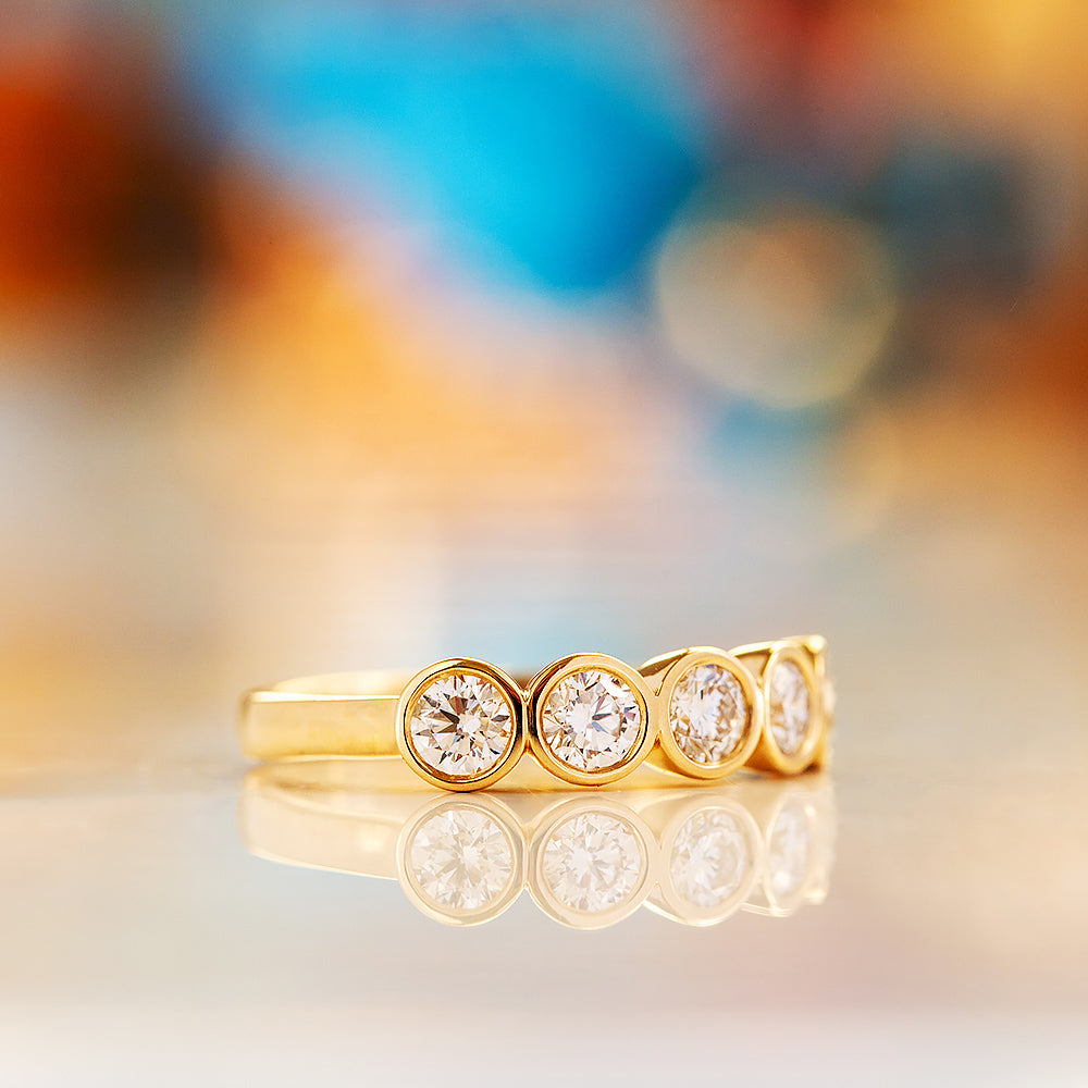 Violet, a Lab Diamond Bezel Set Half Eternity Ring