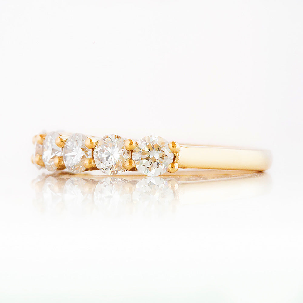 Seven, a Mined Diamond Half Eternity Ring